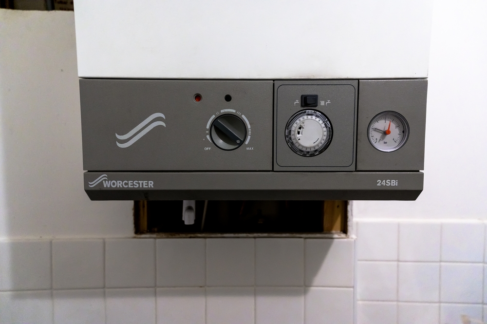 Plumber repairing a leak in a Lowestoft home